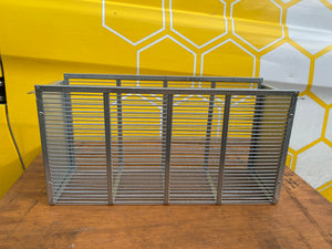 Three-frame metal Wielkopolski hive spacer.